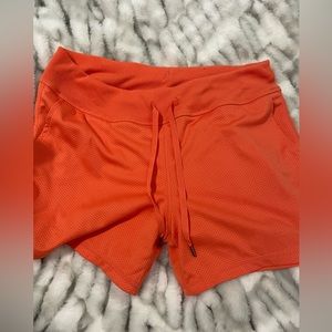 Tangerine athletic shorts